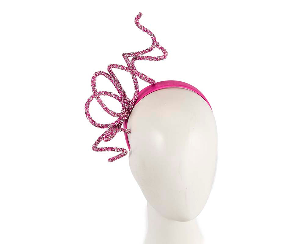 Bespoke sculptured fuchsia fascinator by Cupids Millinery